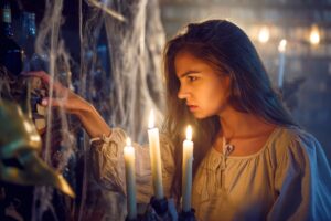 crazy-demonic-woman-with-candle-choosing-potions.jpg